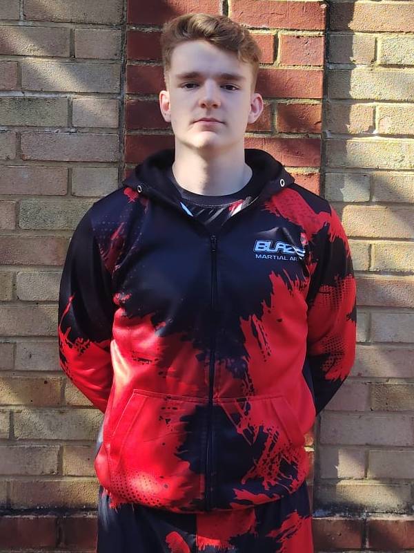 Blaze Martial Arts instructor Josh in uniform for children’s and adult kickboxing classes in Windsor