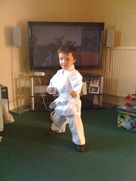 Blaze Martial Arts Instructor, Cyrus on his first night in the kids kickboxing class at Ascot